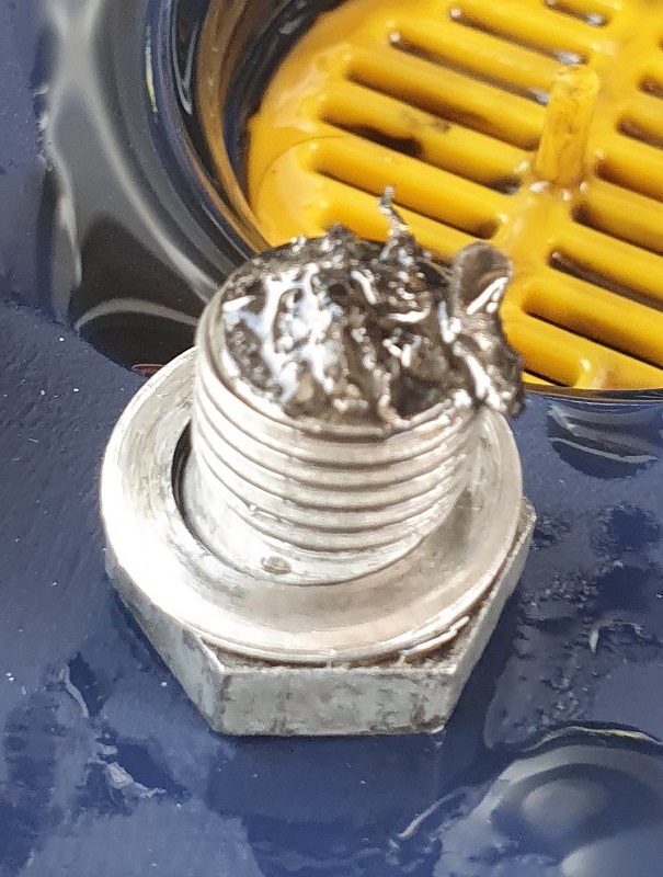 Späne auf Magnetschraube